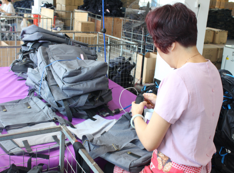 OUKA final backpack inspection and packaging